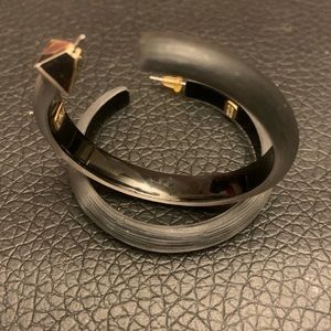 Alexis Bittar stamped black hoop pierced earrings. Comes in the pouch.